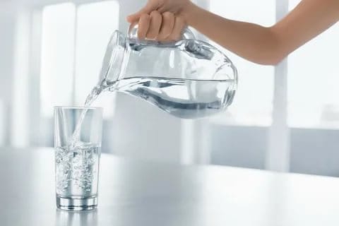 Drinking aplenty water for flat stomach.
